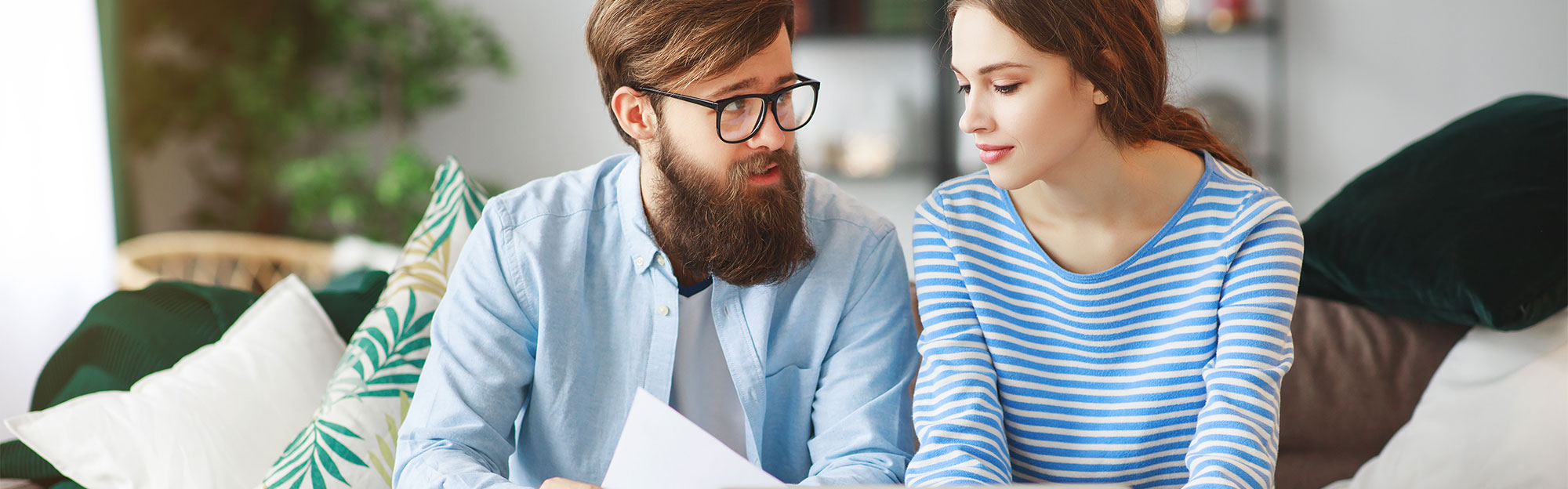 Temenos Infinity Collections - Man and Wife looking over paperwork
