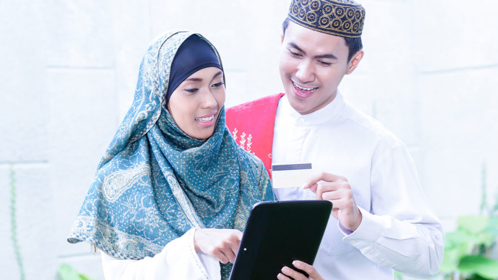 Temenos Wealth - Muslim couple using tablet