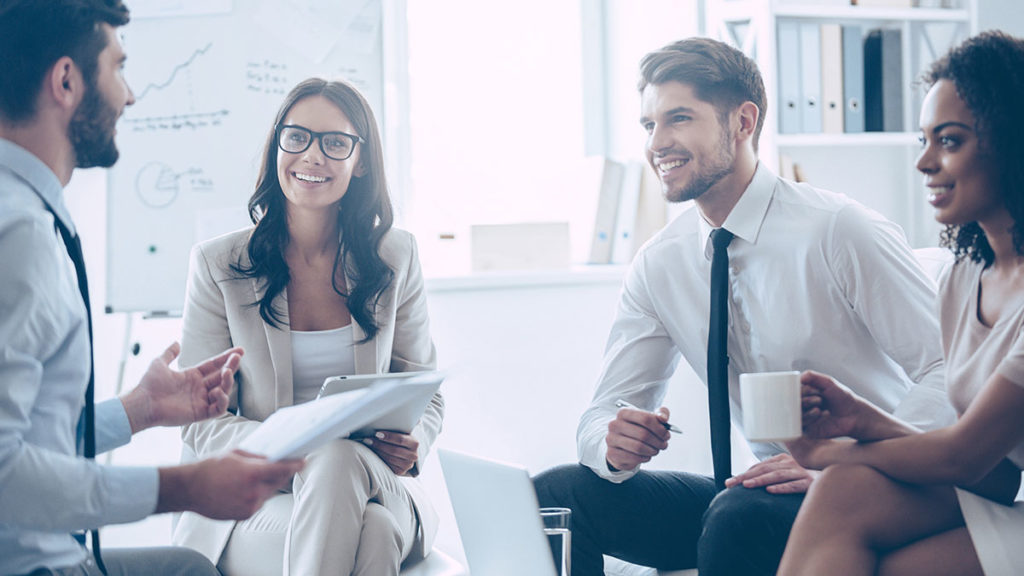 Model Bank Approach - co-workers in a team meeting