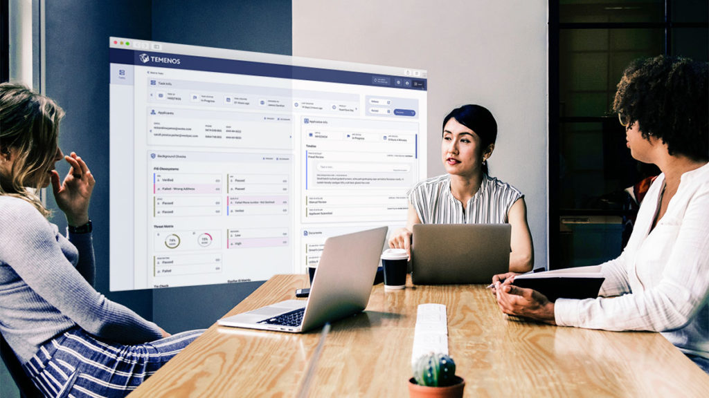 Why Temenos Infinity - Women looking at Journey Analytics screen