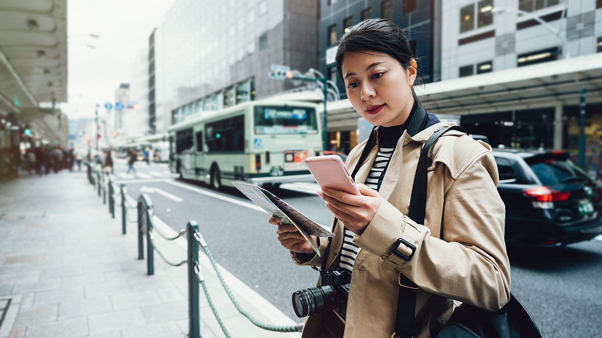 Financial Inclusion - Tourist looking for directions