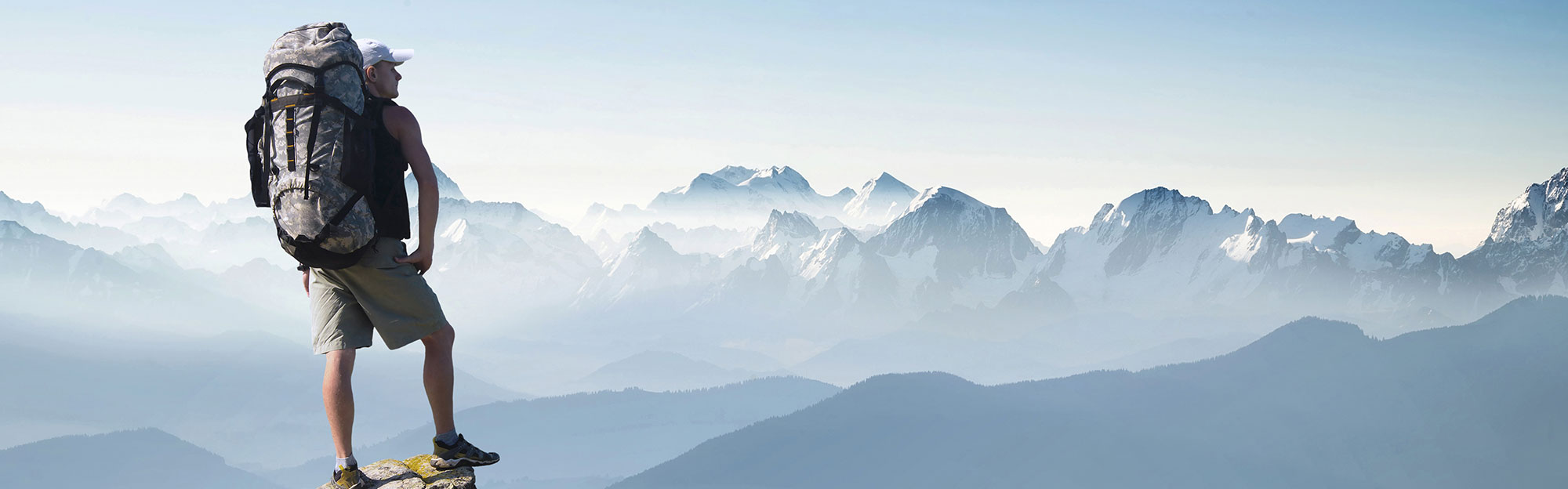Man contemplating his epic climb