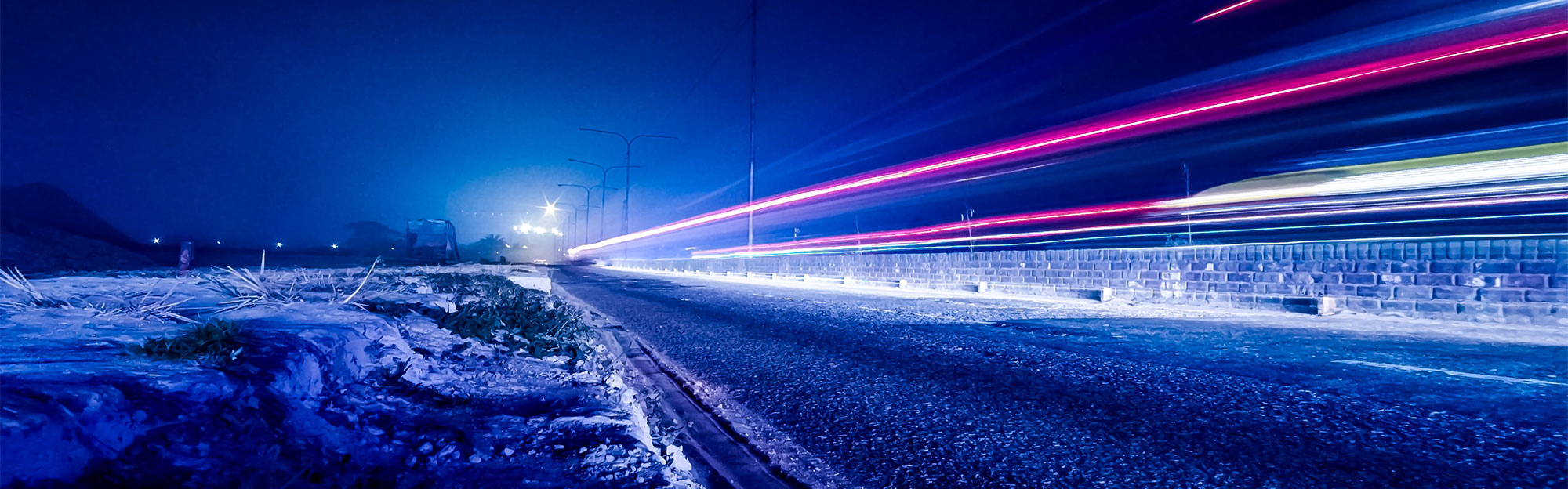 time lapse photography of vehicle light during nighttime